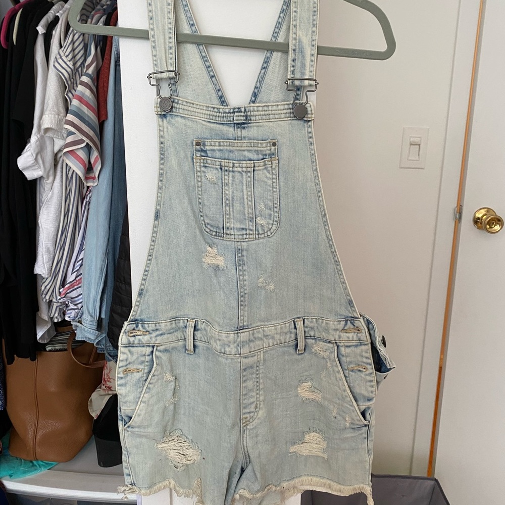 light wash overall shorts w/ light distressing